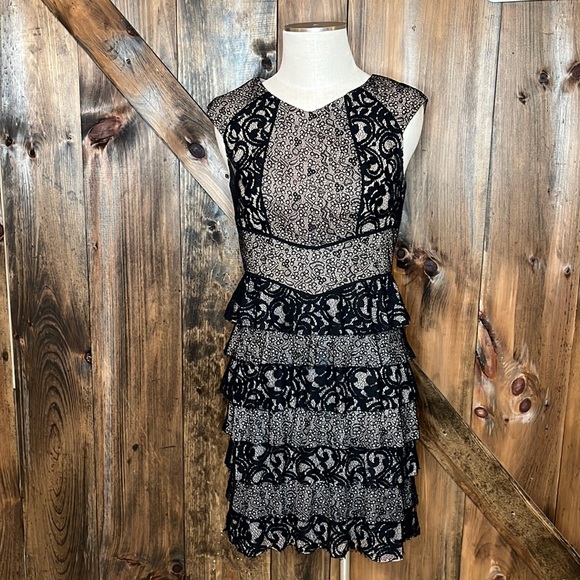 BCBGMaxAzria Dresses & Skirts - BCBG Maxazria Tan & Black Lace dress